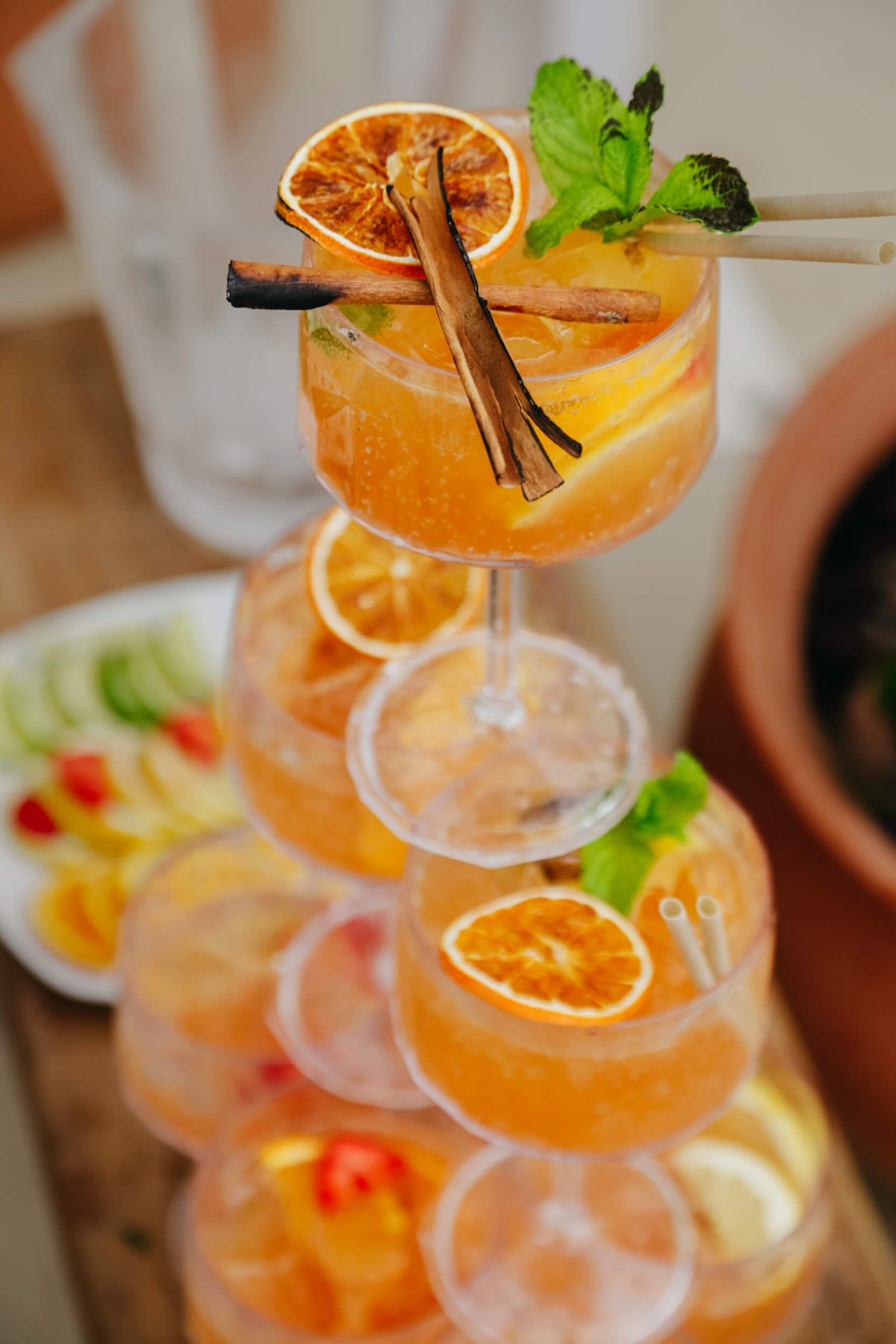 Orange cocktails stacked on top of eachother