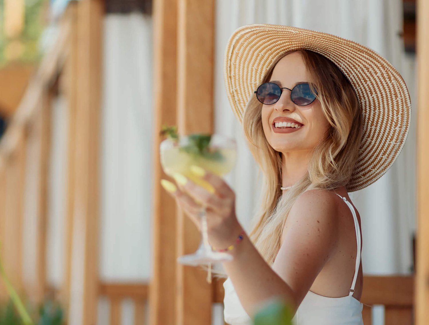 Lady enjoying a cocktail at a brunch