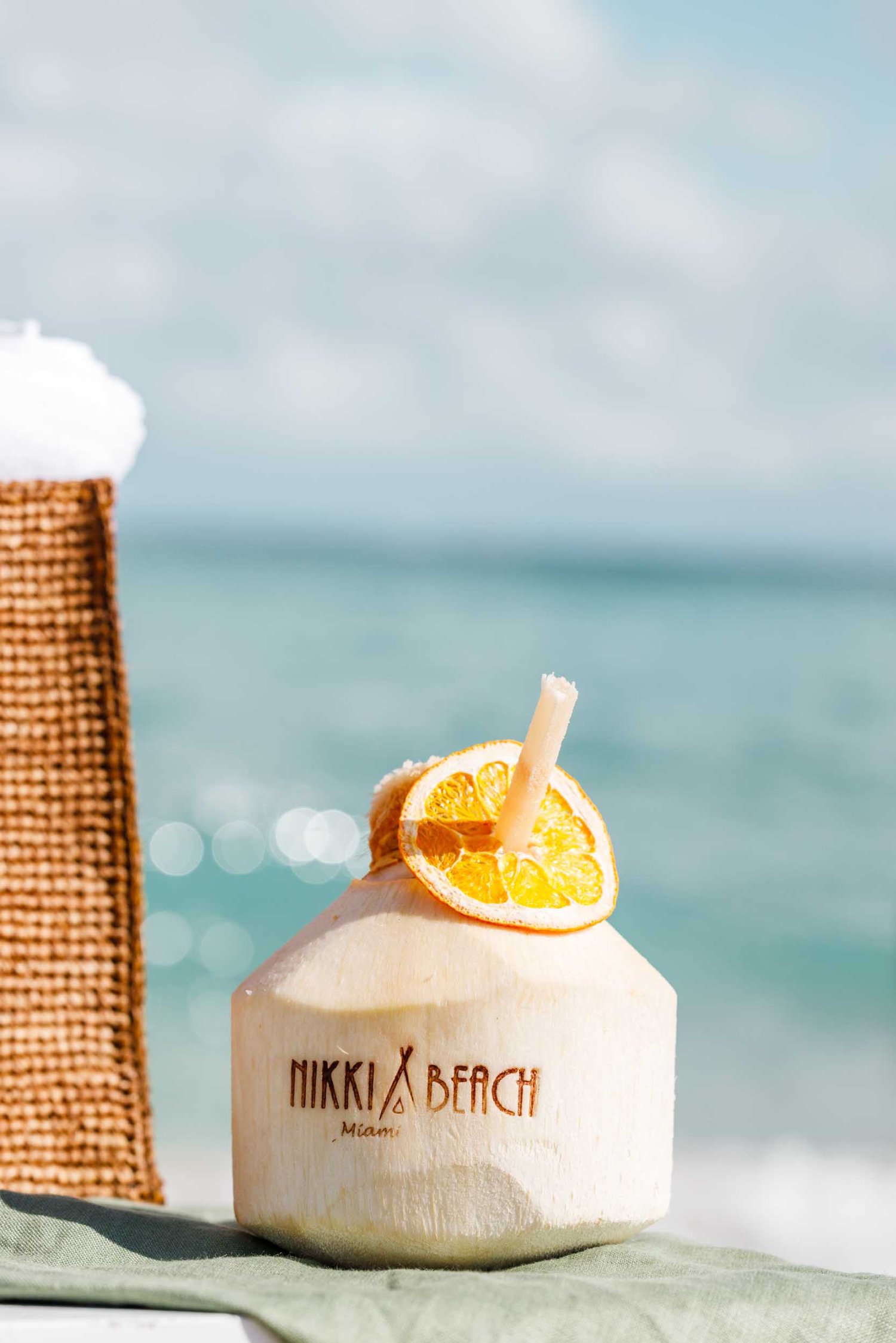 Nikki Beach Miami - Coconut drink with Nikki Beach branding