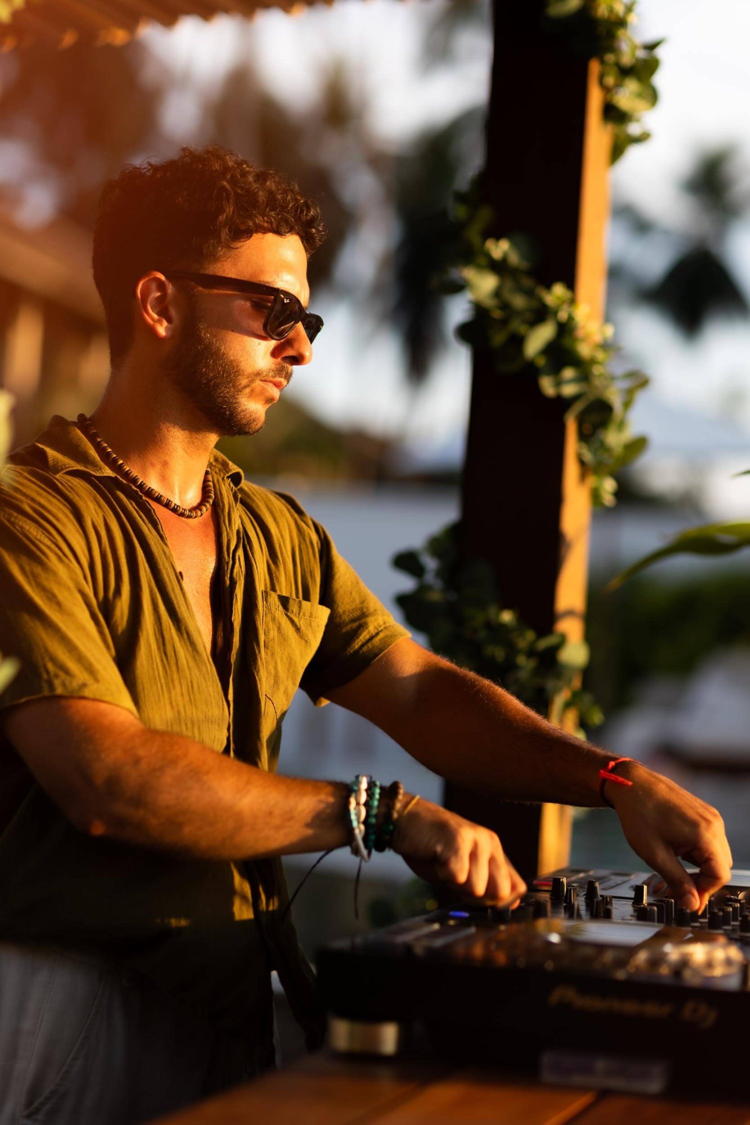A man mixing on DJ decks