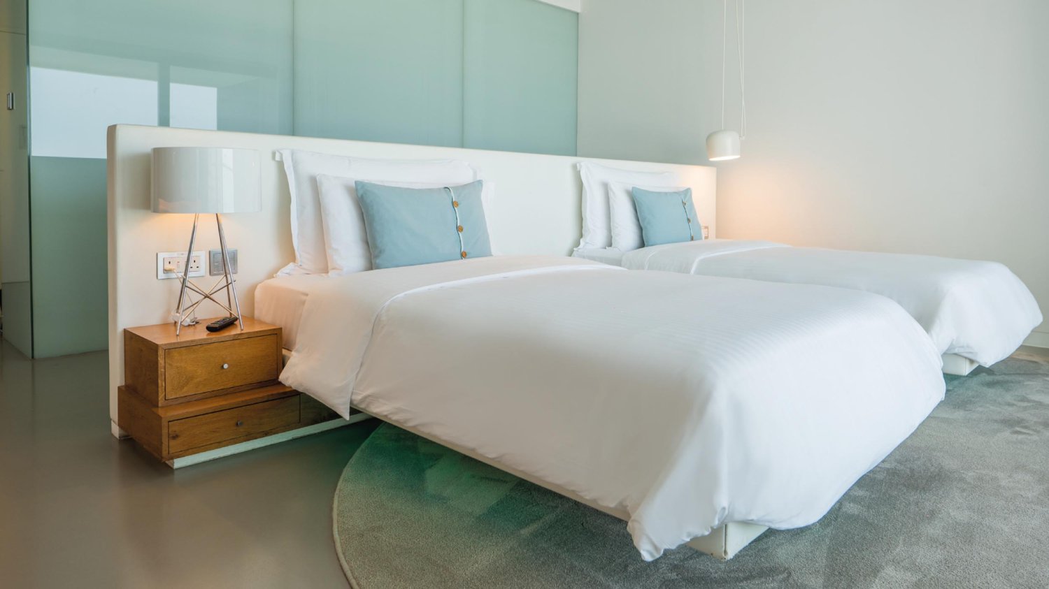 Two single beds and a bedside table