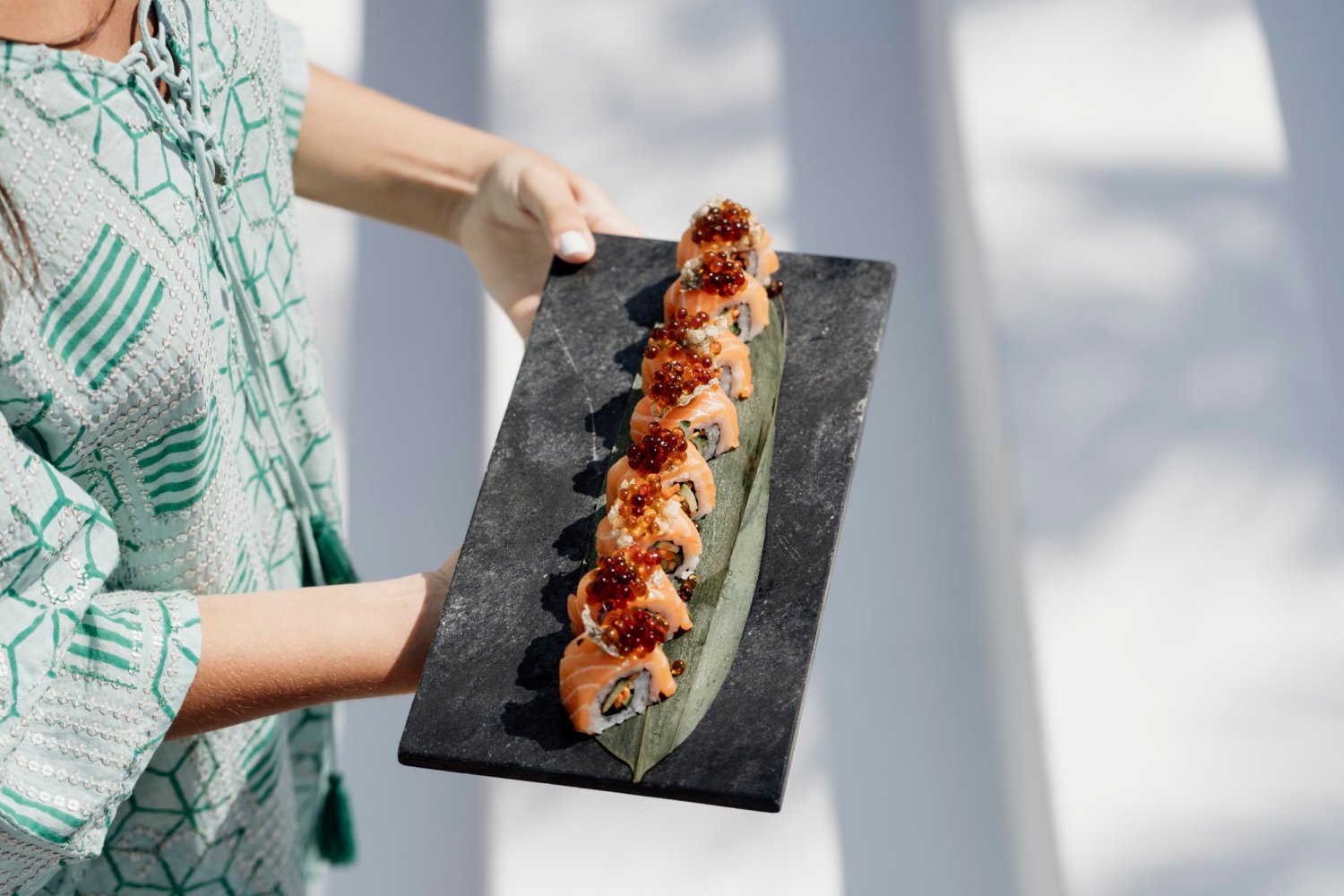 Nikki Beach Santorini - Slate plate with sushi