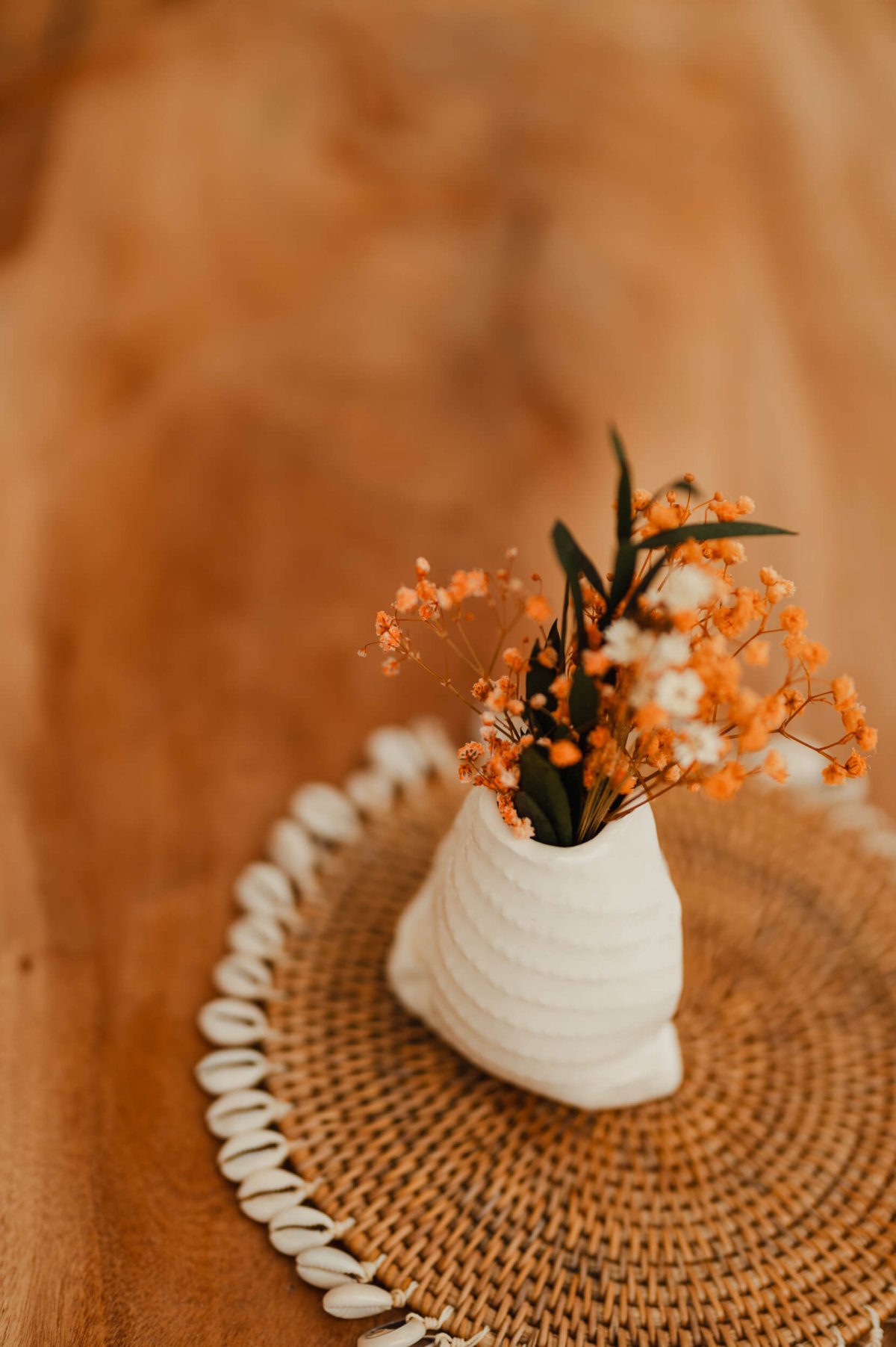 Flowers in a small white bag