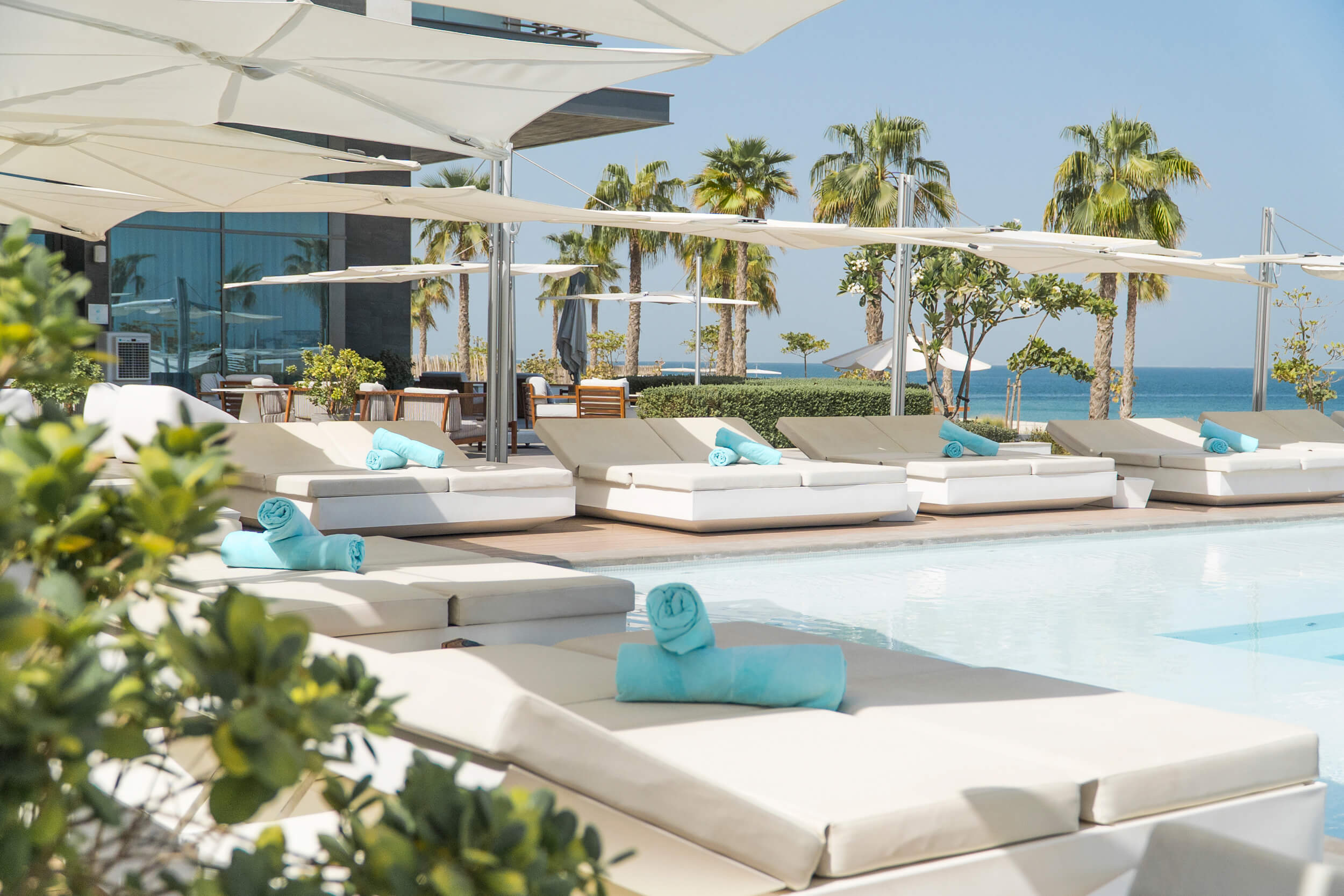 Hotel Pool with sun beds and umbrellas