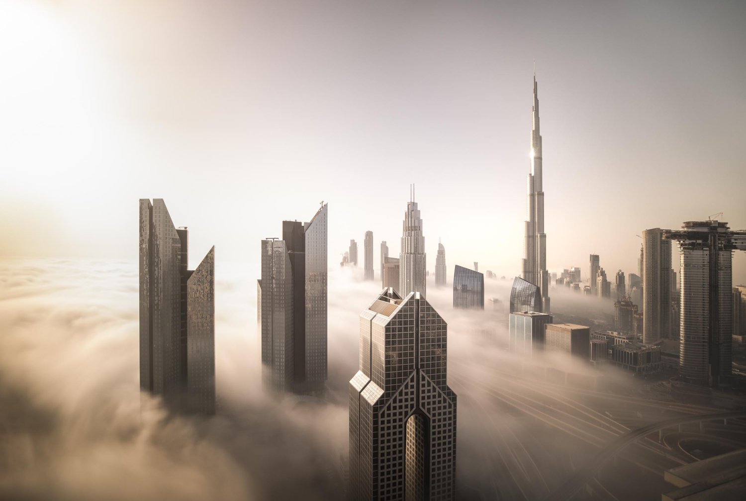 Cityscpae of Dubai Downtown skyline on a foggy winter day. Dubai, UAE.