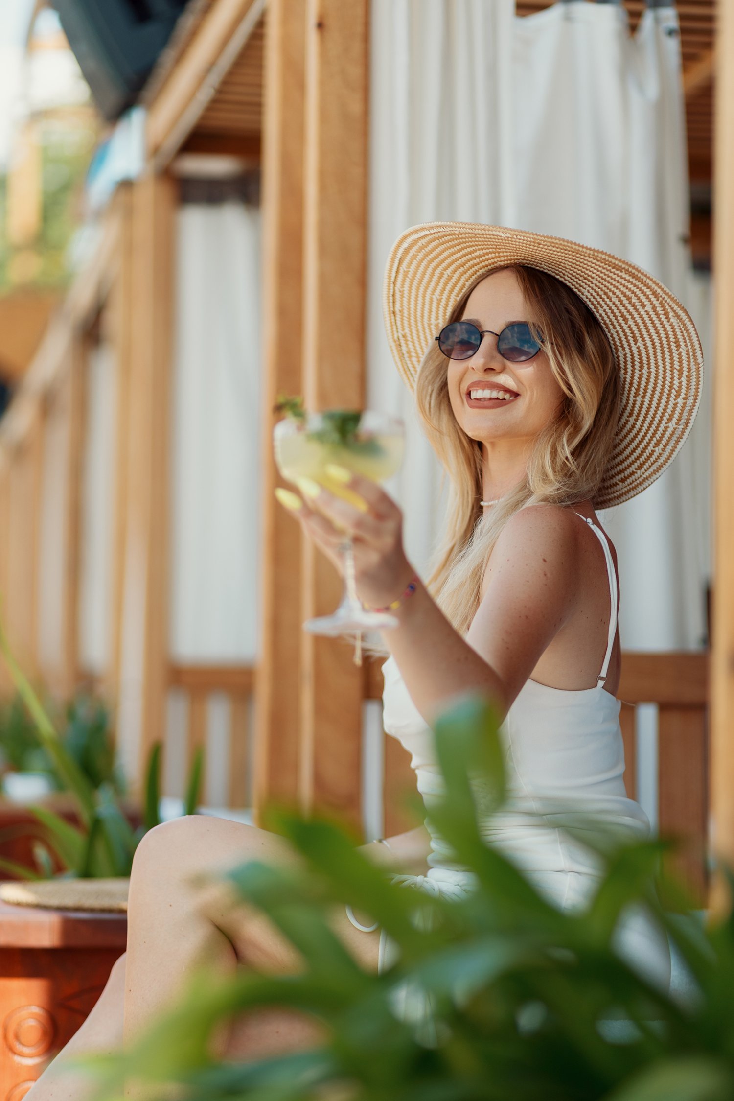 Lady enjoying a cocktail at a brunch