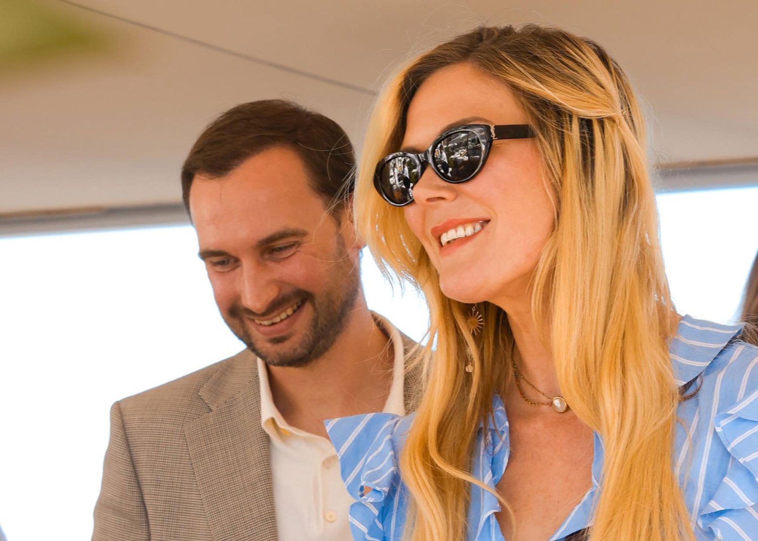 A man and women smartly dressed at an event at Nikki Beach event