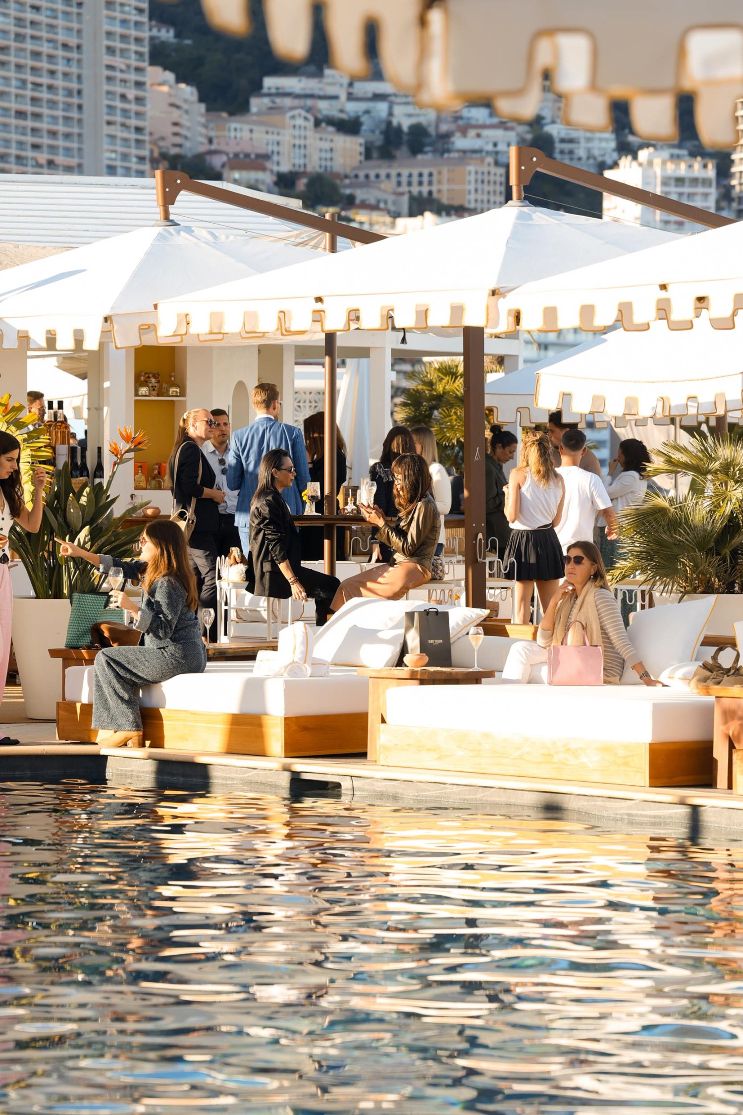 Poolside image of guests at Nikki Beach