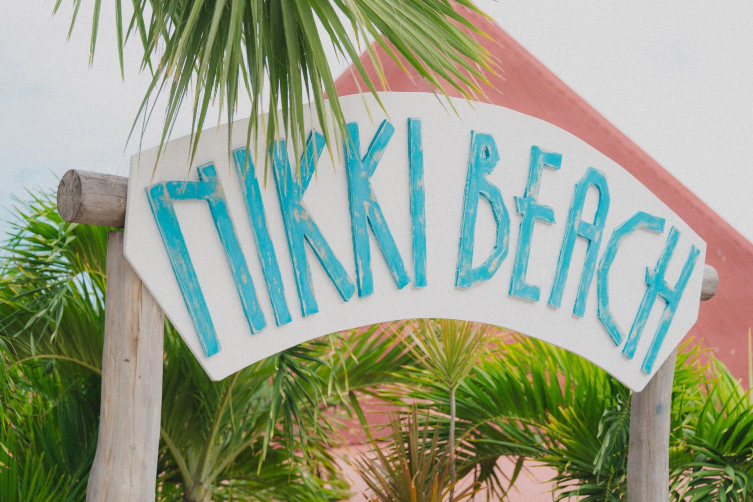Nikki Beach archway with palm trees