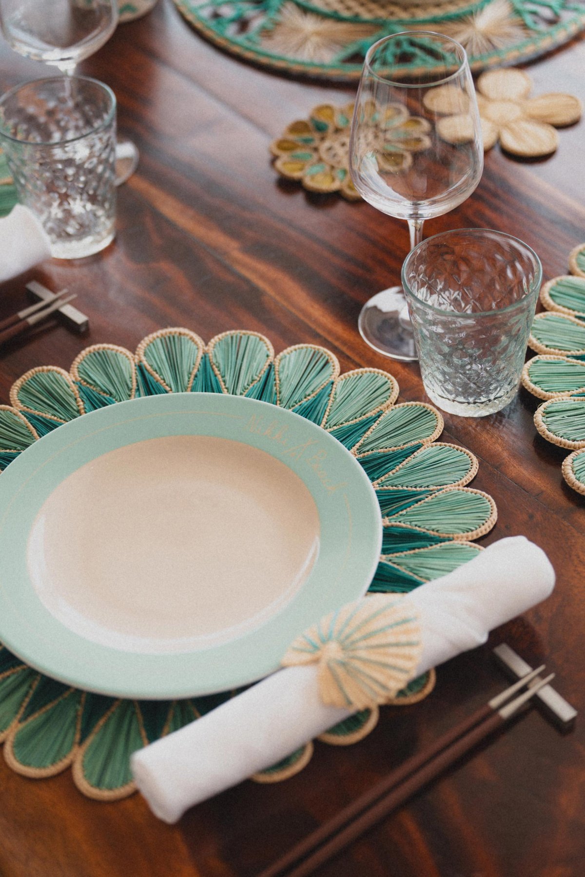 A decorative plate set on a dining table