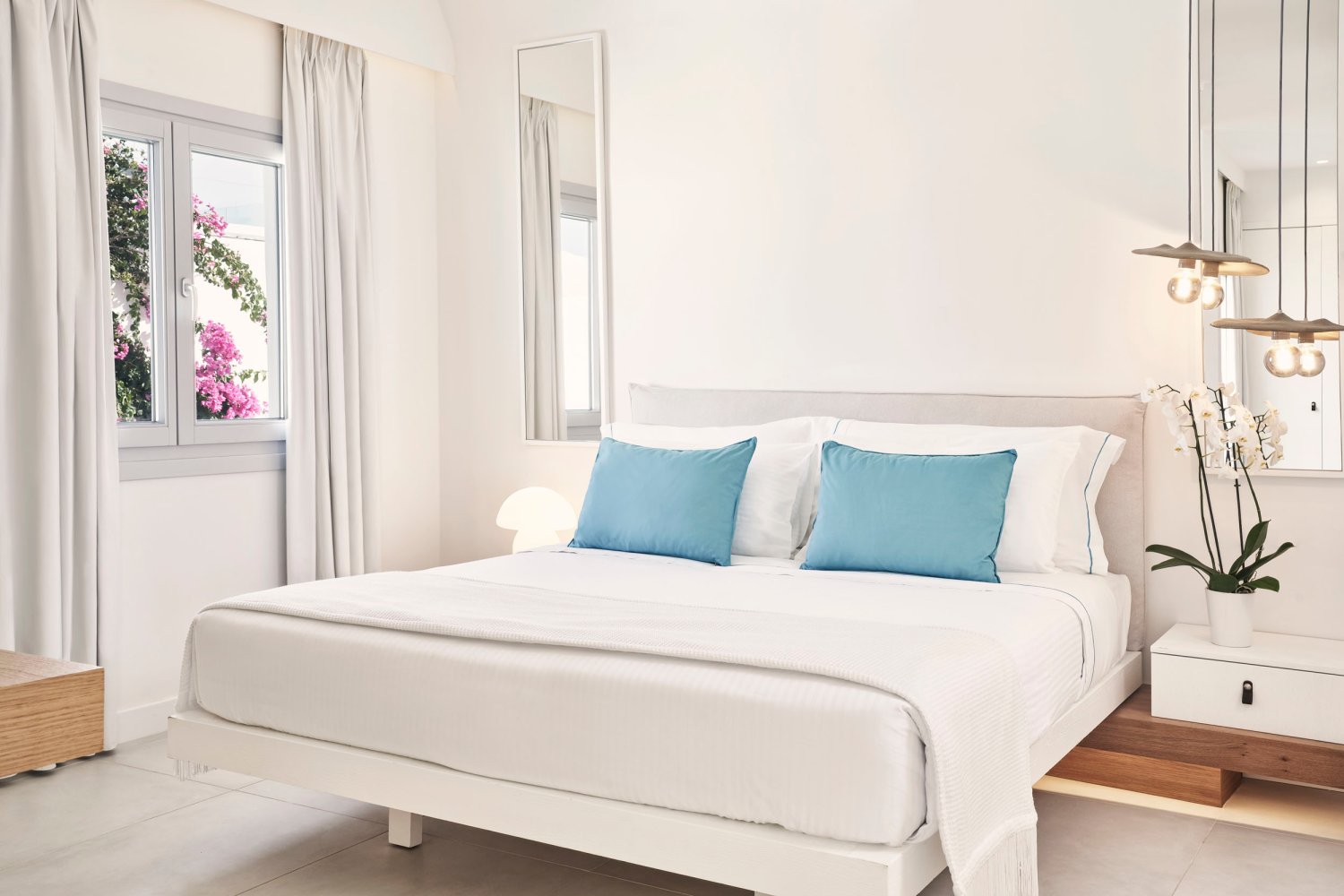 Signature Room with Sea View, double bed with bedside table