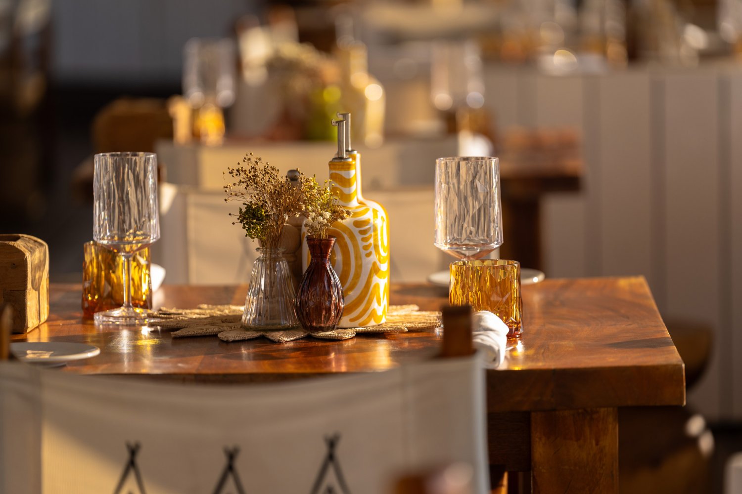 Dining table with glasses and decoration