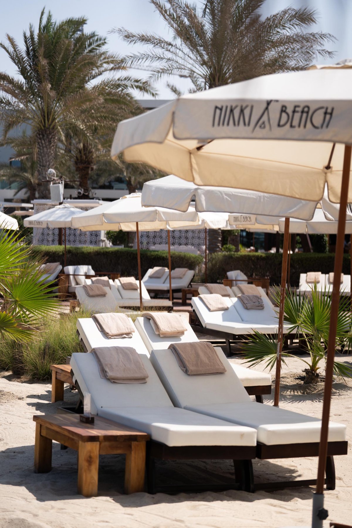 Sun loungers on the beach with umbrellas