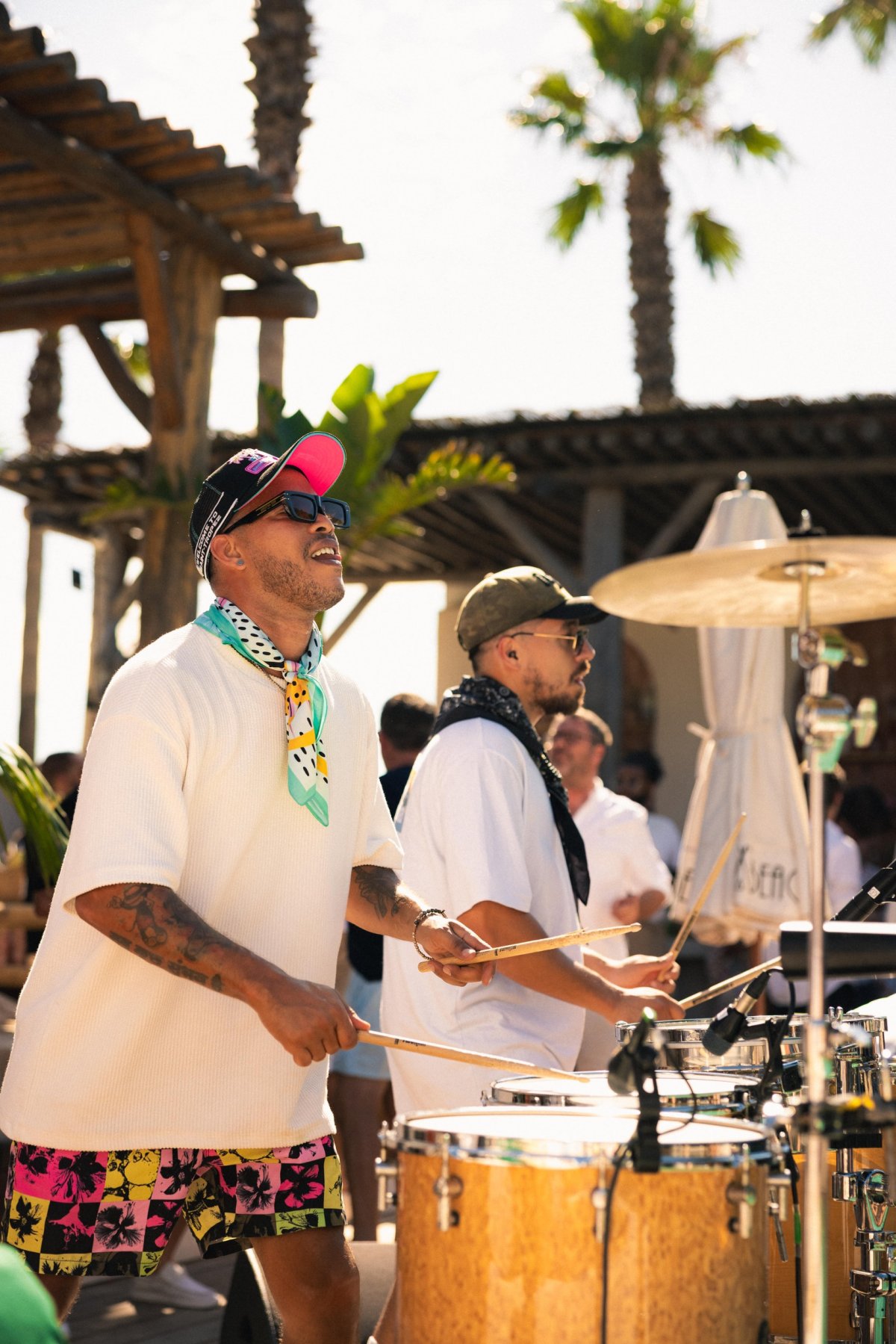Our resident percussionists keep the tempo alive, blending soulful rhythm with the laid-back luxury of St. Tropez. Every drumbeat tells a story of celebration