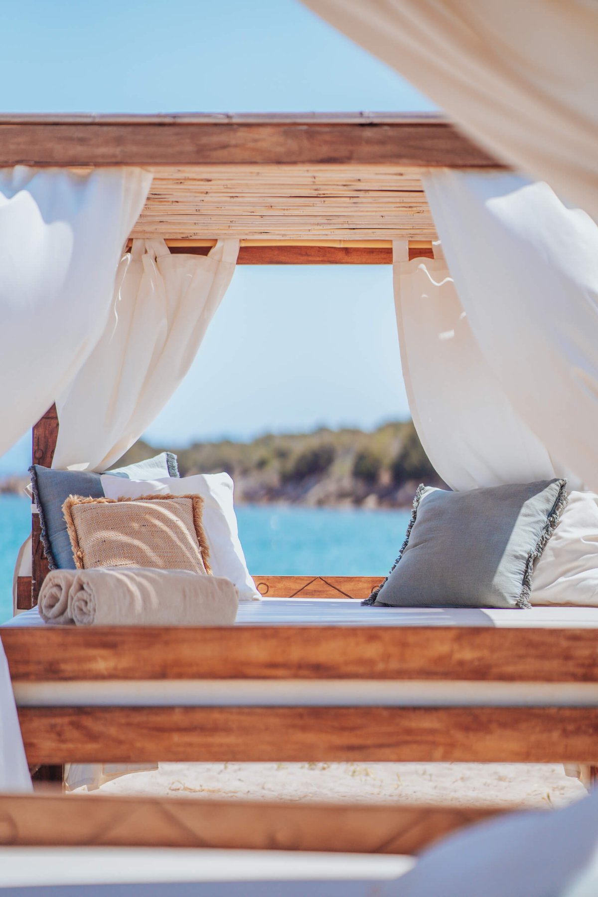 Sun loungers with the sea in the background