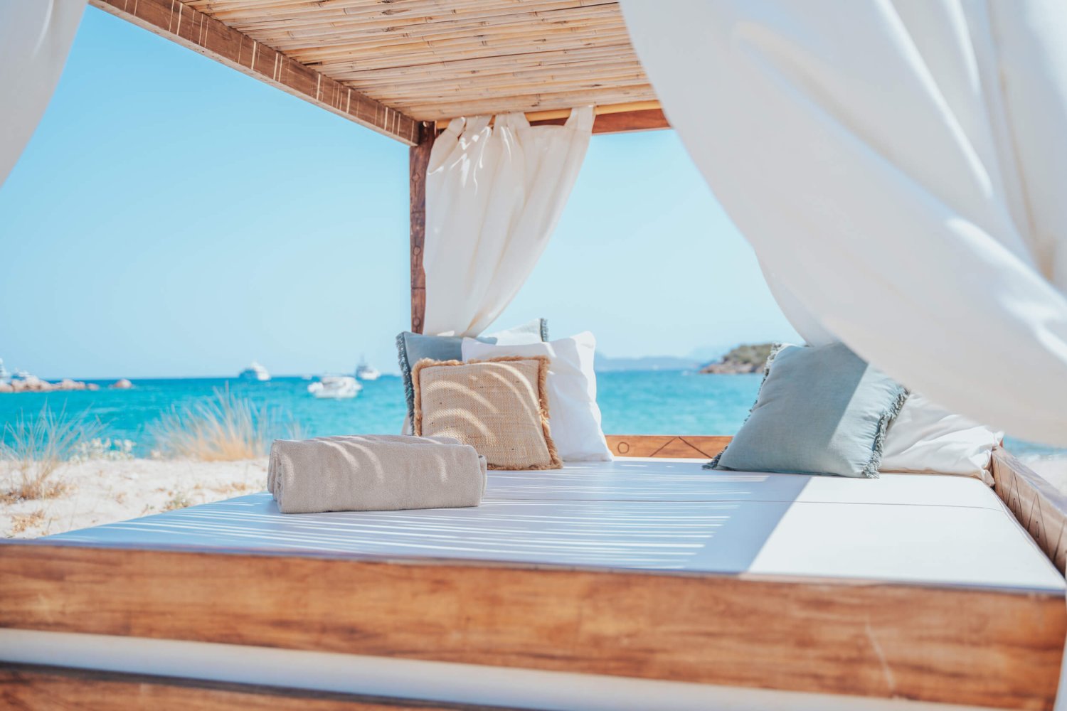 Large sun lounger on the beach close up