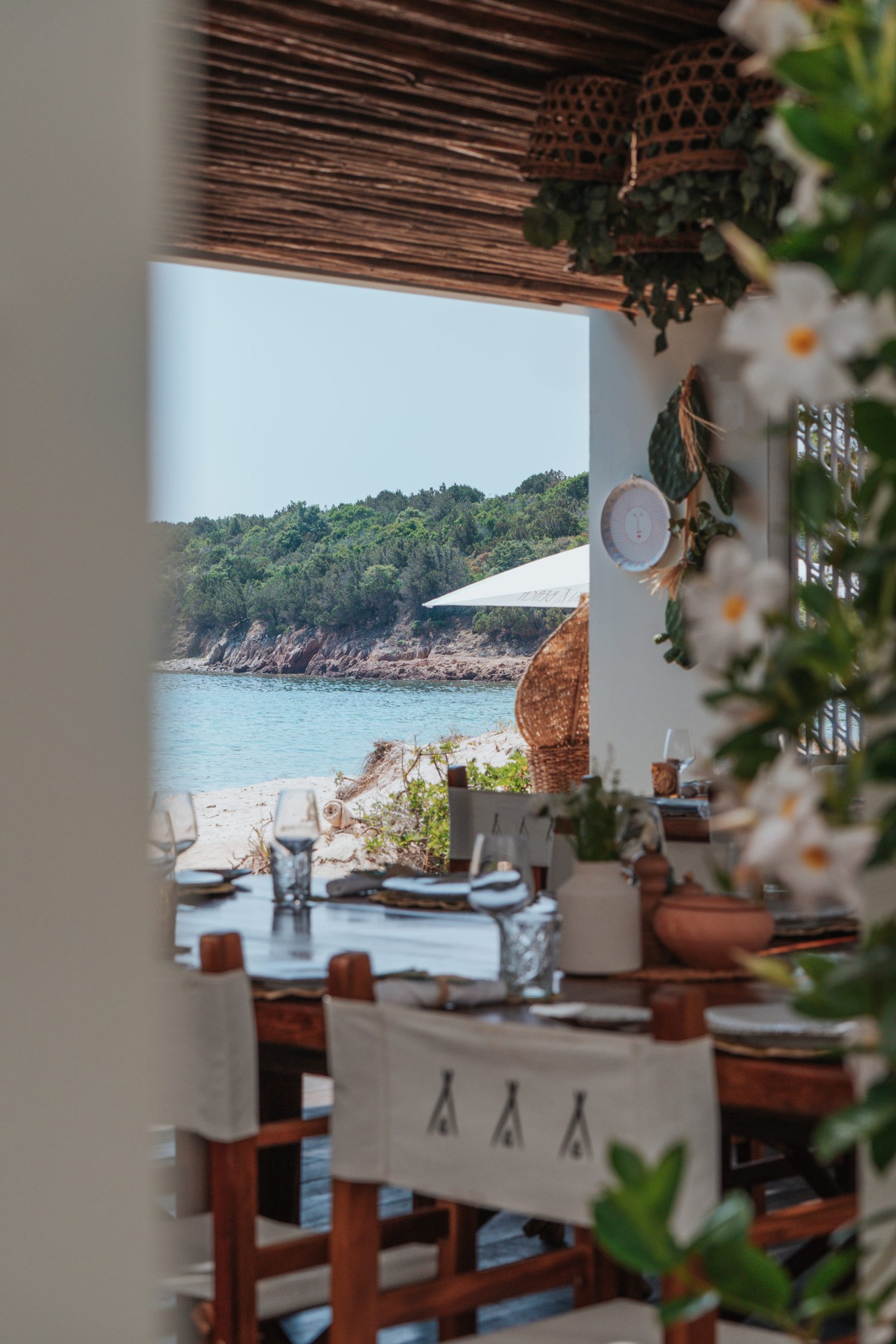 Outdoor dining area with a view of the beach