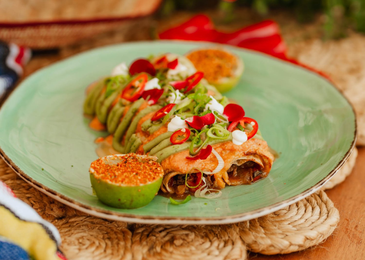 Close up of nikki beach dish garnished with chillies and lime