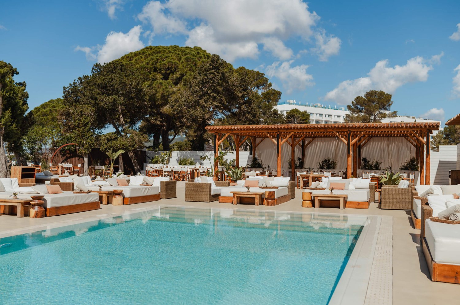 Sun loungers by the pool at Nikki Beach Ibiza