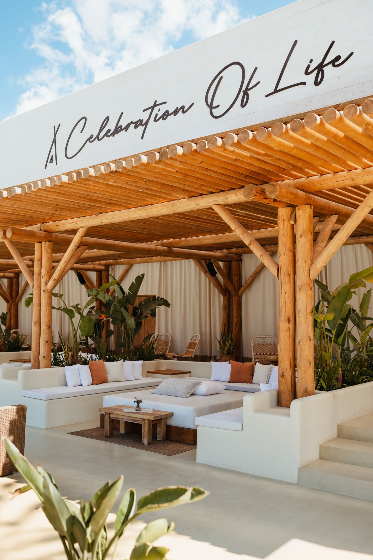 An outdoor seating area under a 