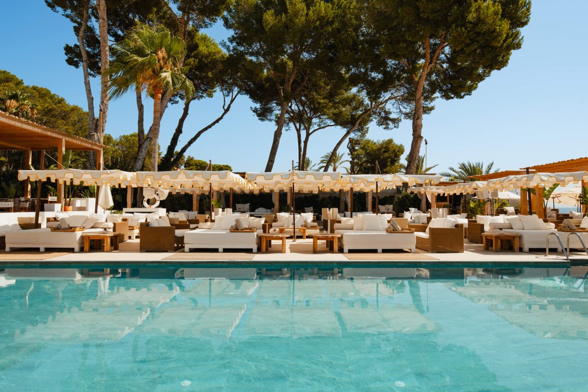 Wide shot of the pool and sun loungers at Nikki Beach Mallorca