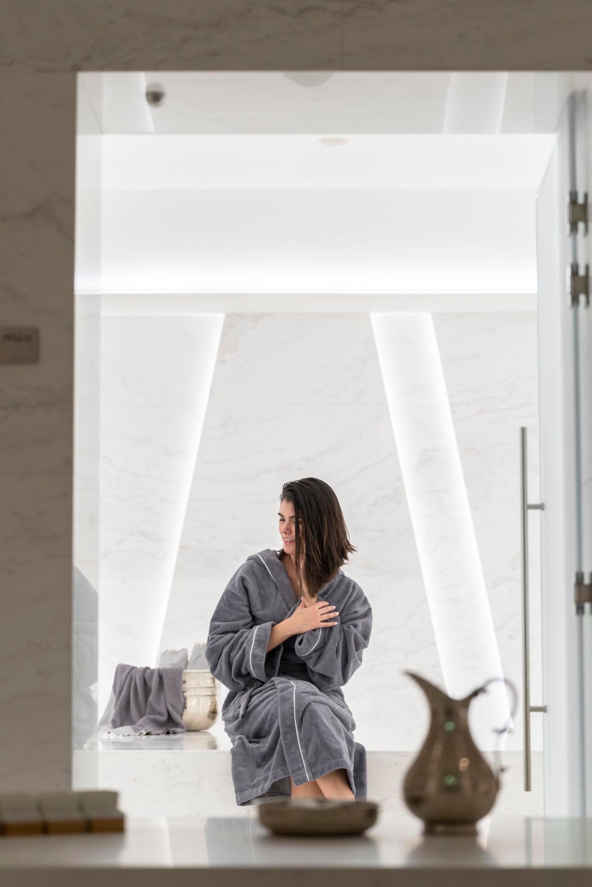 A women in Nikki Spa wearing a bathrobe