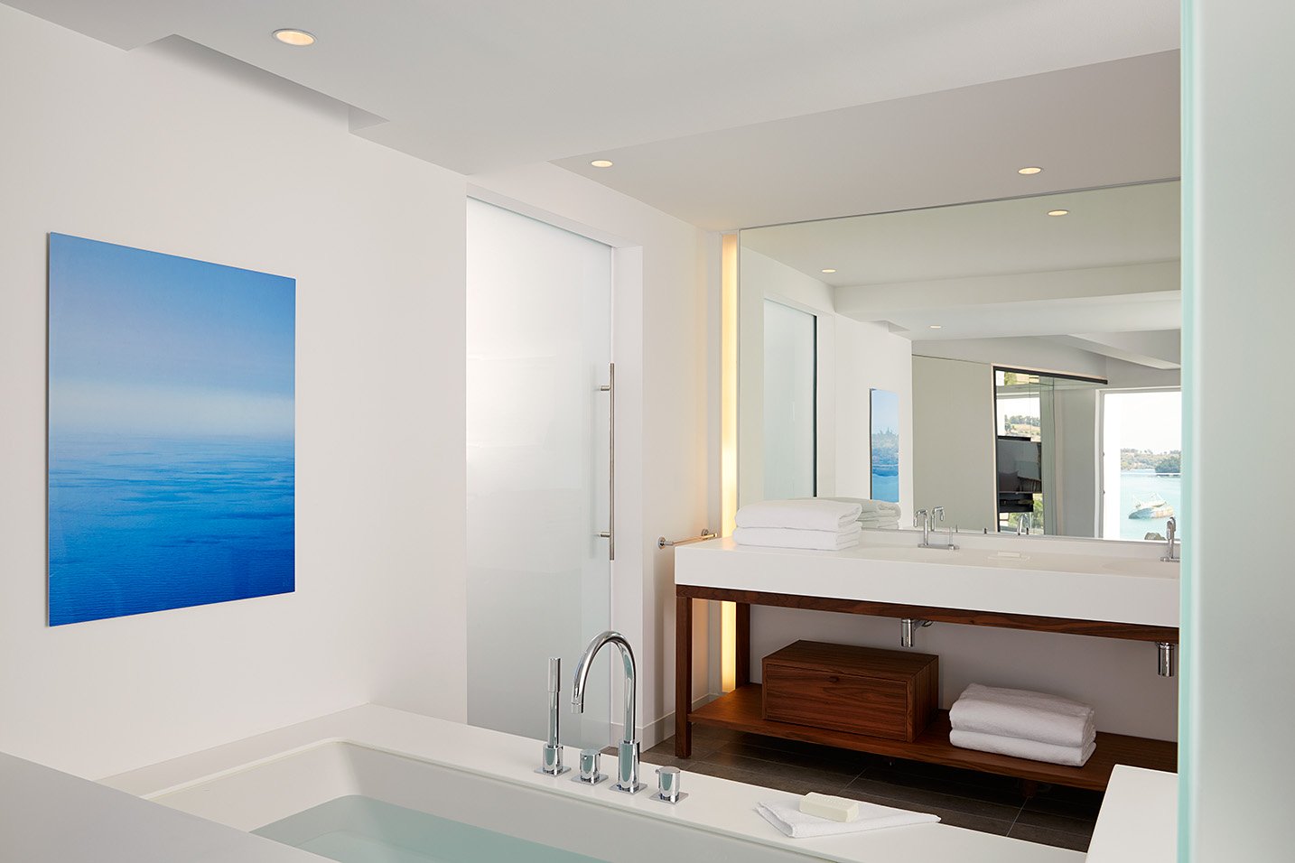 Bathroom with bathtub, shower room and large basin area