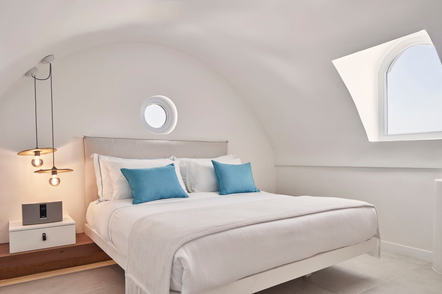 Signature Room: double bed with bedside table