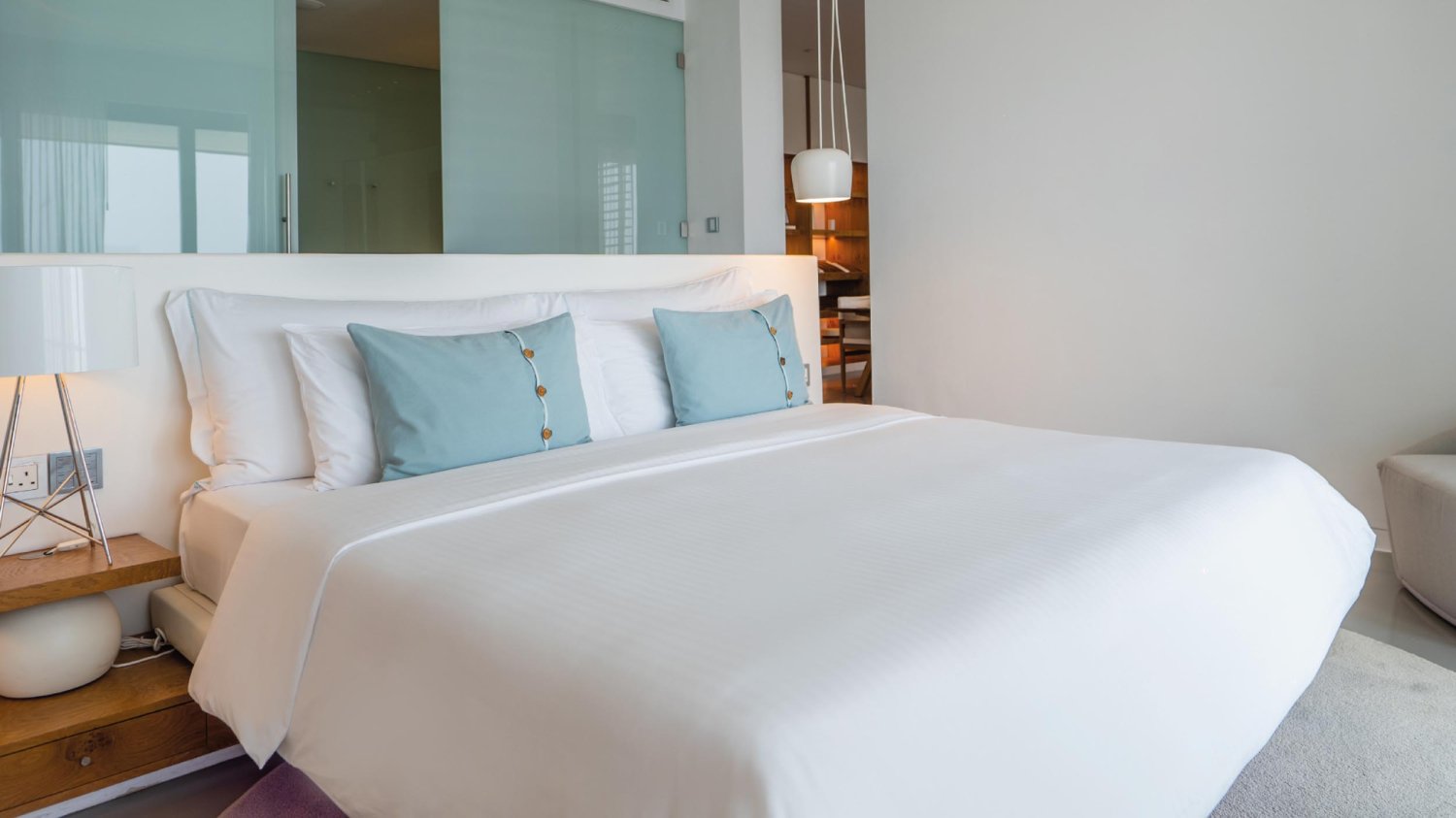 King sized bed with bedside table