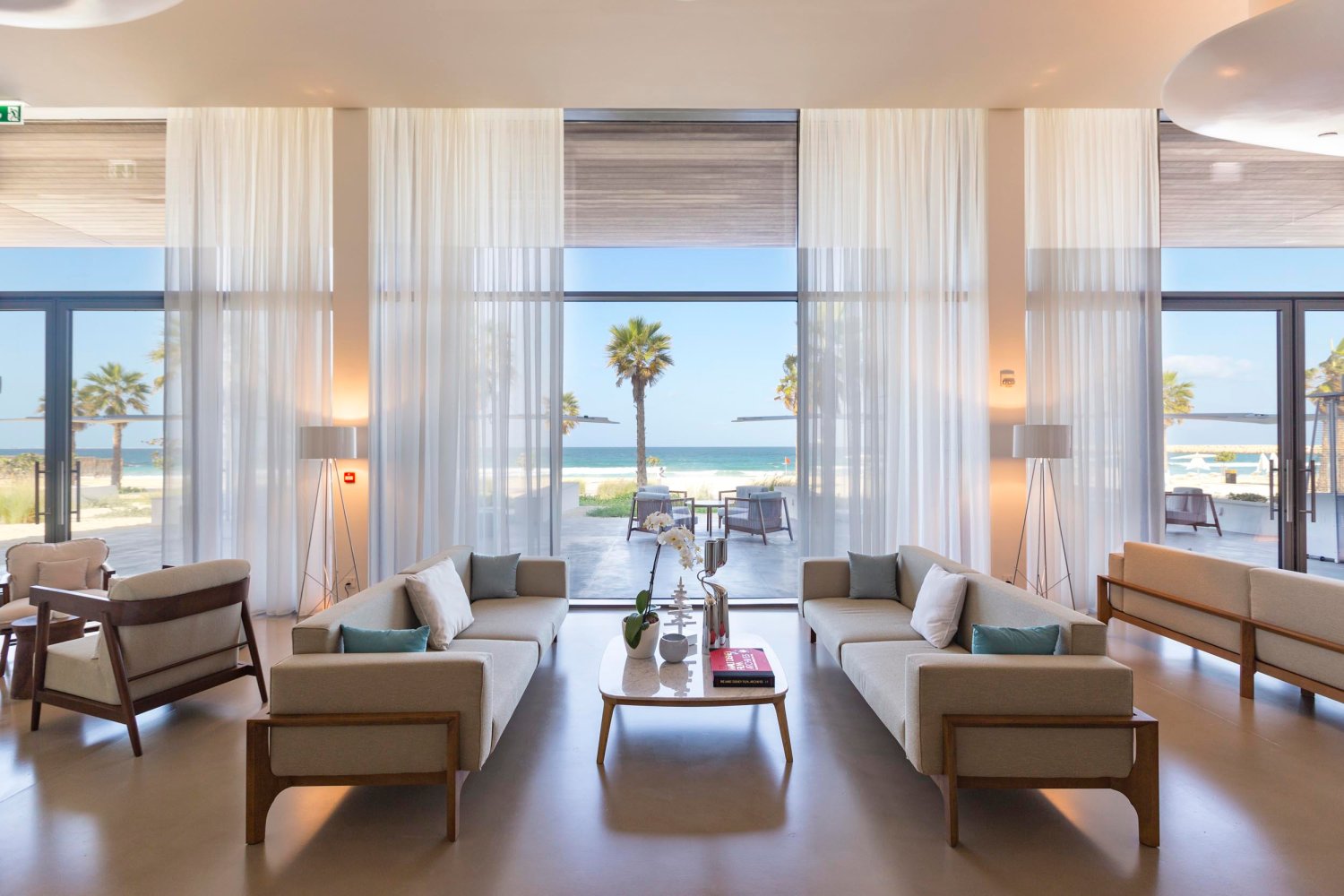 Soul lounge: sofas looking out to beach front