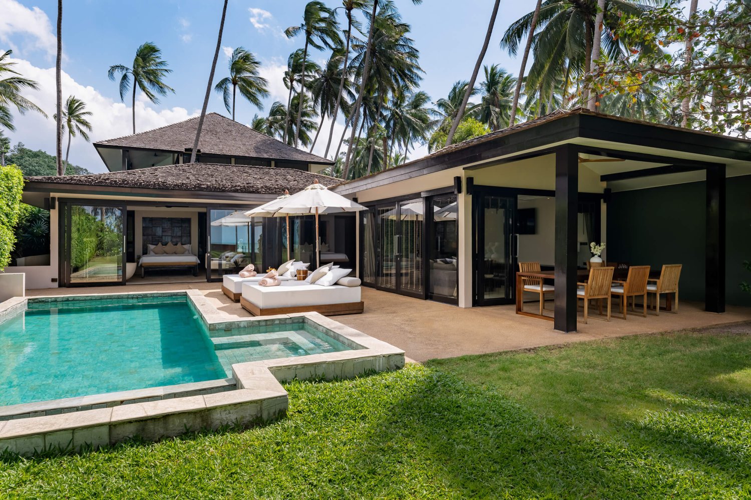 Ultimate beachfront villa with private pool: An exquisite villa showcasing a serene pool and stylish lounge area