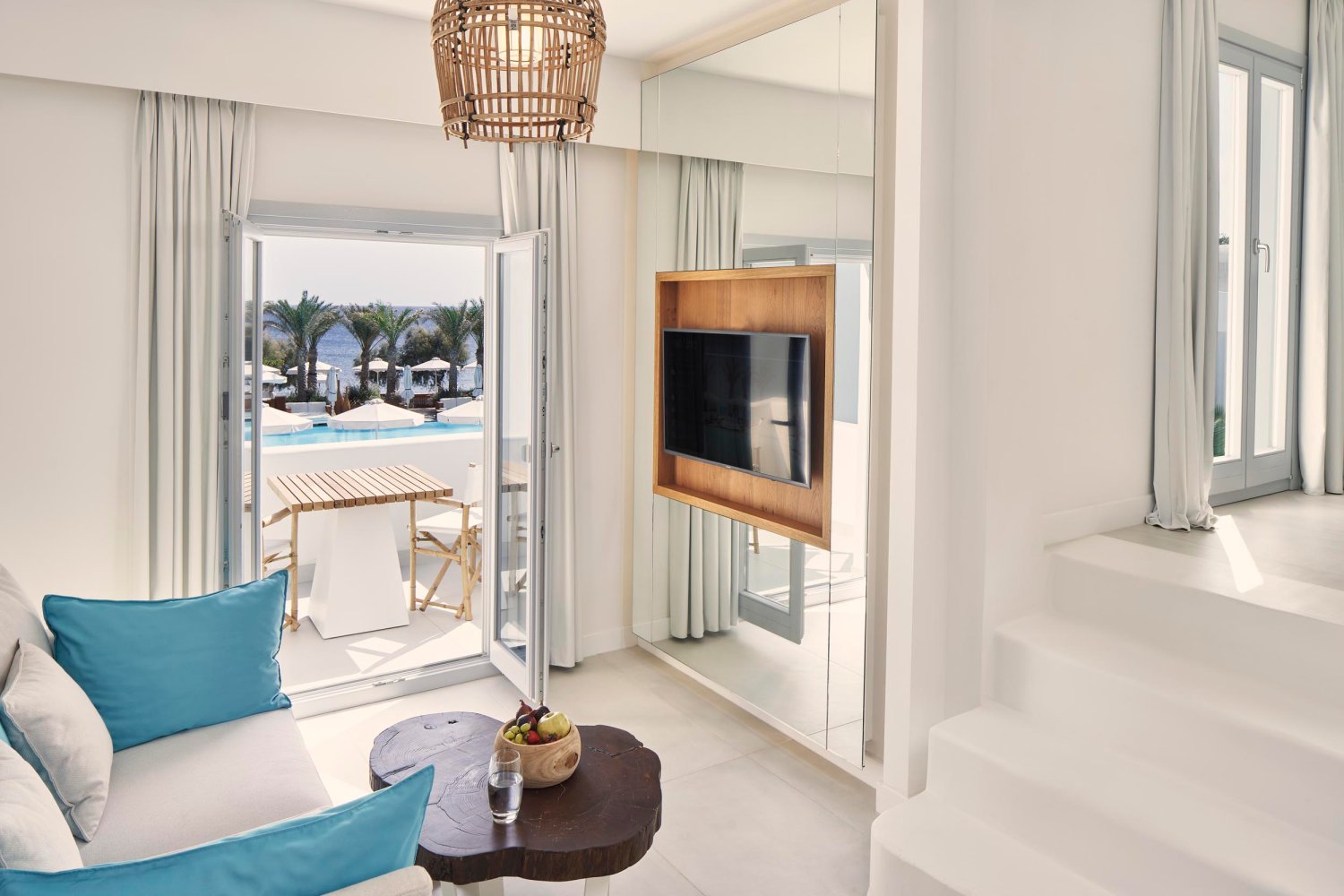 Luxury Suite with Jetted Tub & Sea View, sofa area with tv and coffee table