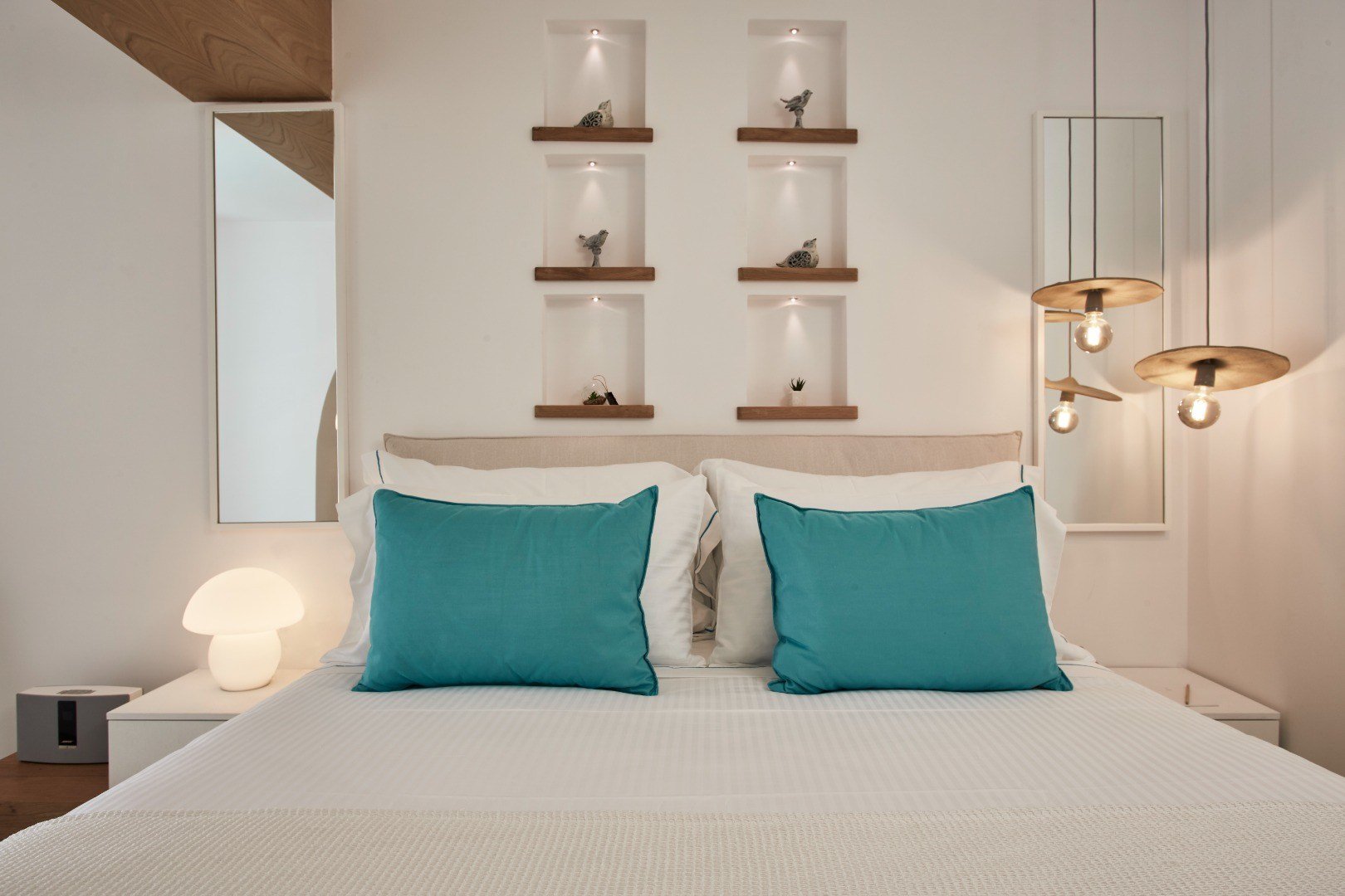 Signature Room with Private Pool: double bed and bedside table