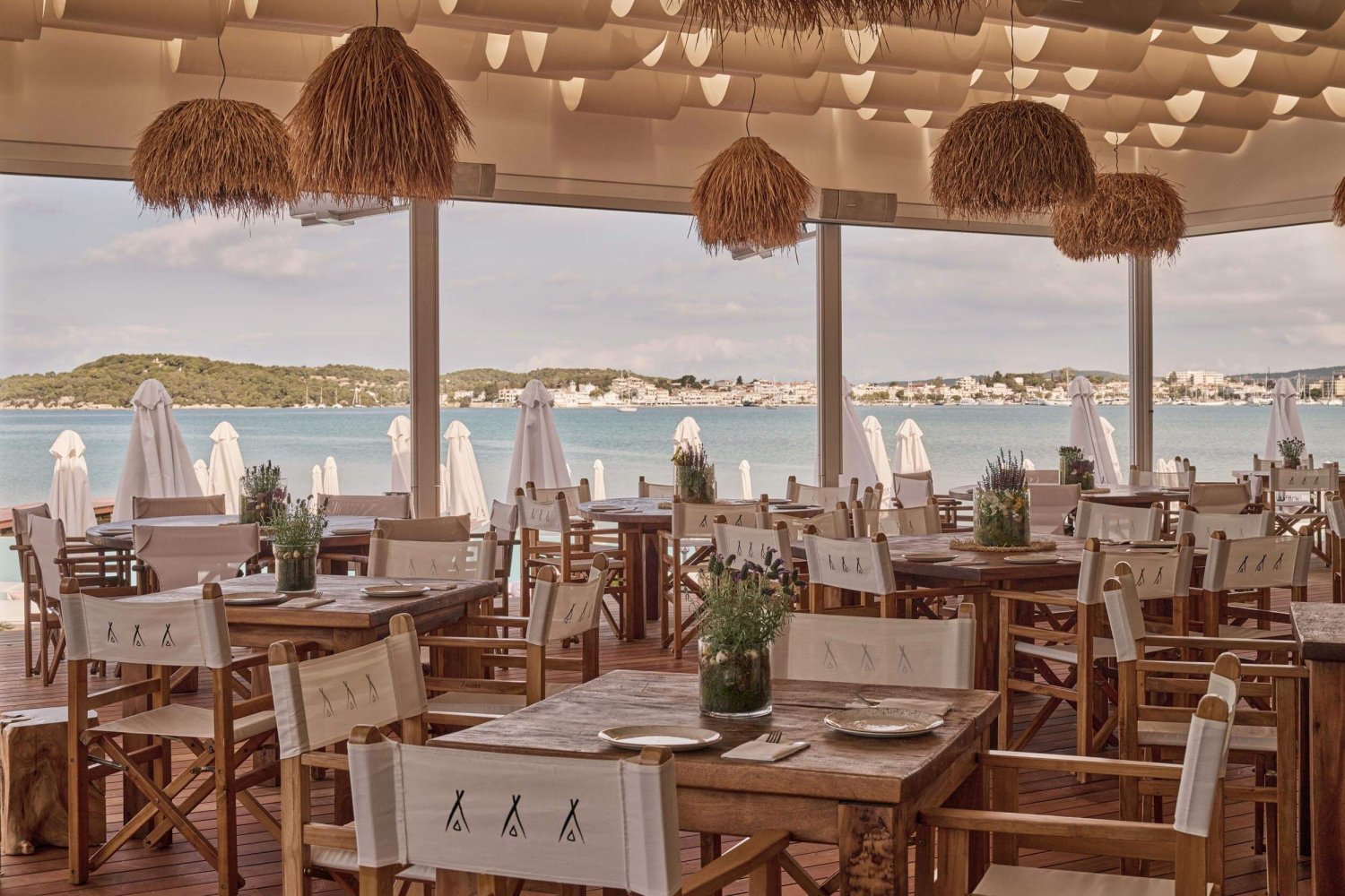 Nikki Beach restaurant with tables looking out to the sea