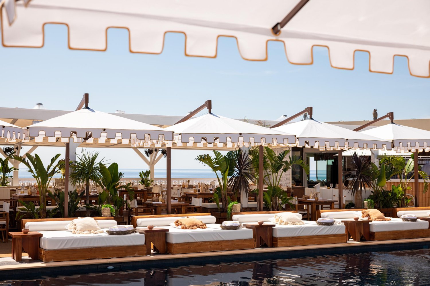 Nikki Beach Mallorca - Pool beds and restaurant