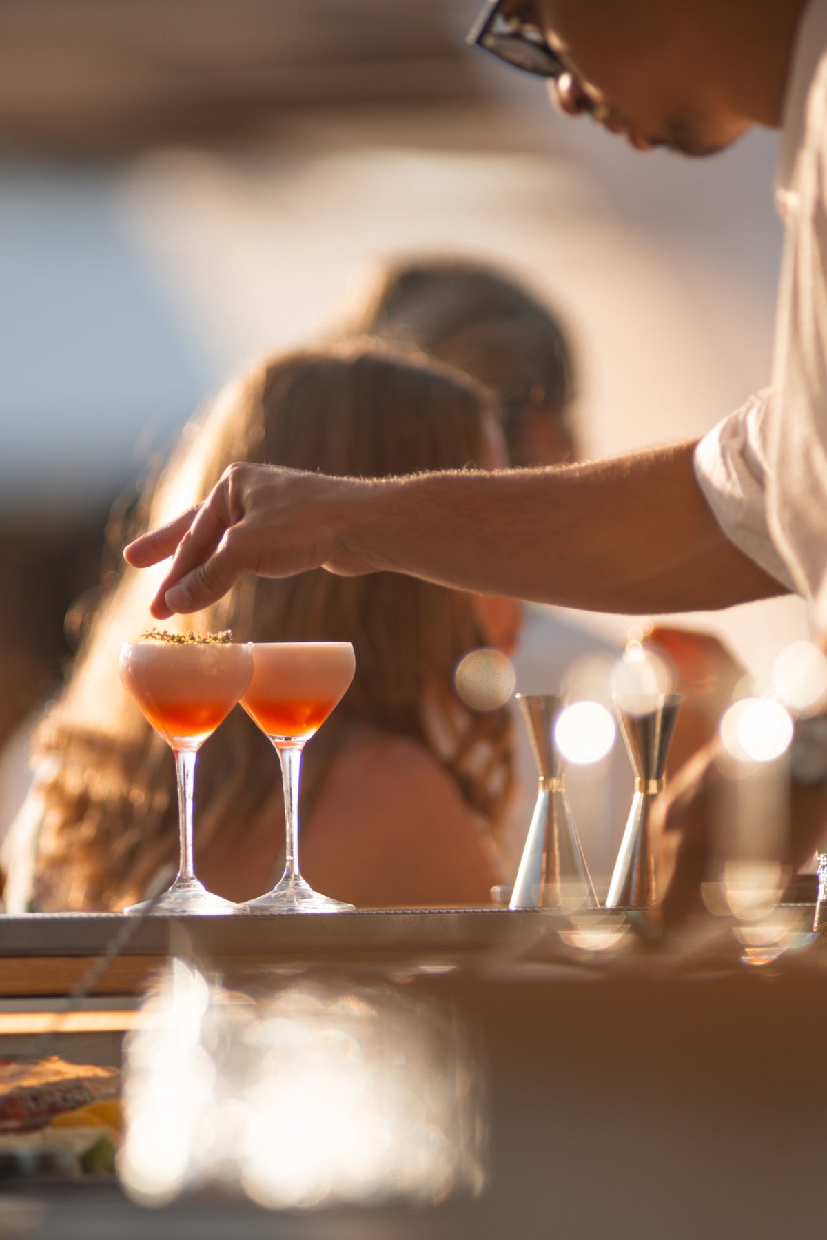 serving a couple of cocktails